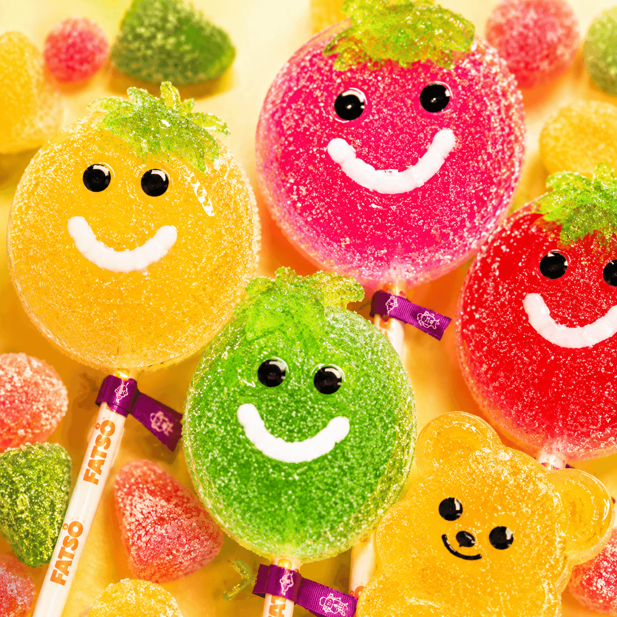 Smiley Fatso lollipops with colourful sugar coating